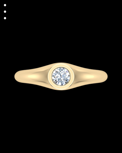 Gold ring with a diamond on a black background