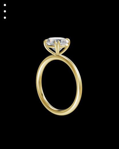Gold ring with a diamond on a black background