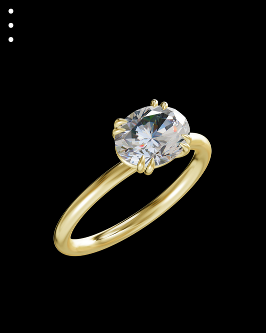 Gold ring with a large diamond on a black background