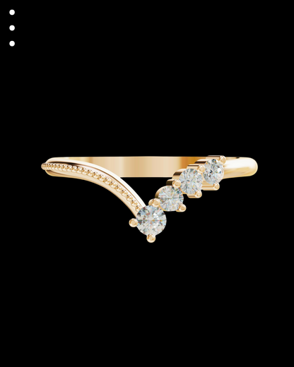 Yellow gold ring with diamond accents on a black background