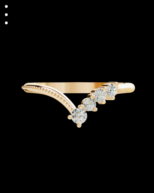 Yellow gold ring with diamond accents on a black background