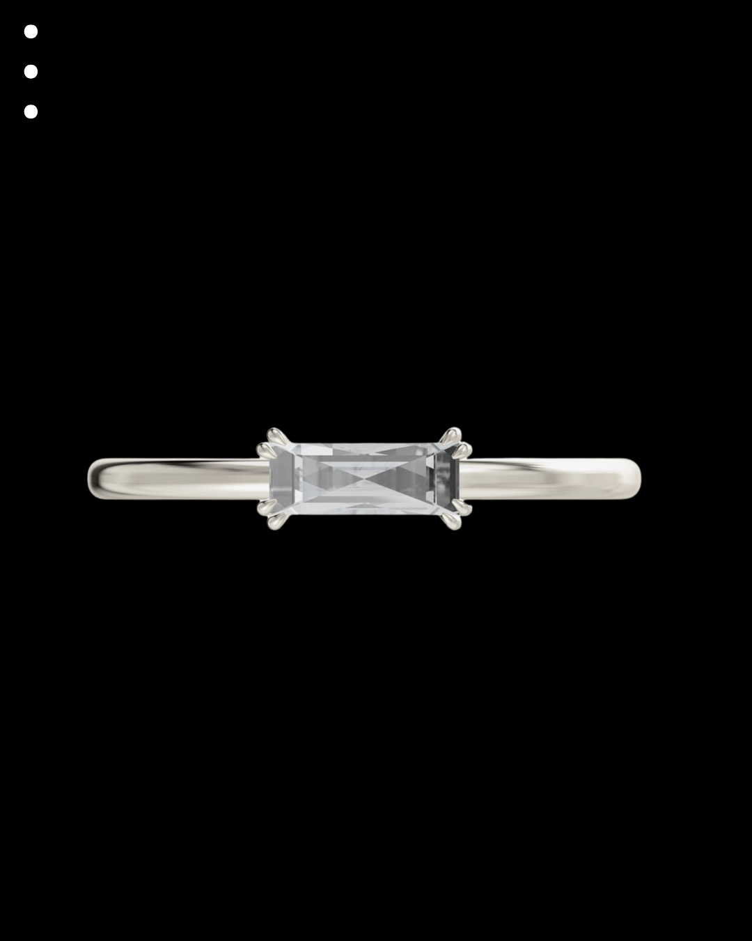Silver ring with a rectangular gemstone on a black background