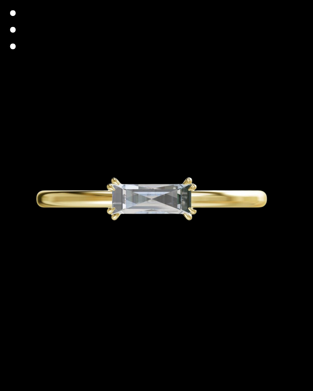 Gold ring with a rectangular gemstone on a black background