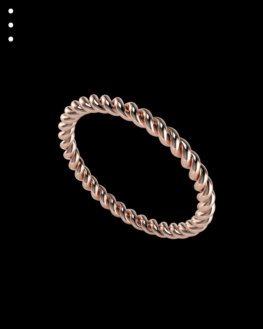 Silver twisted ring on a black background