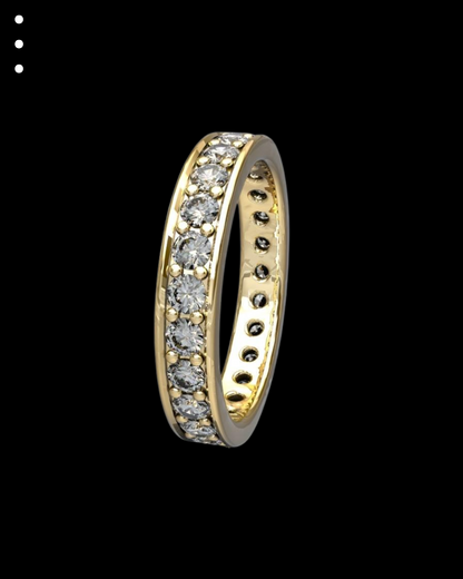 Gold ring with embedded diamonds on a black background