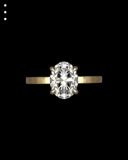 Gold ring with a large diamond on a black background