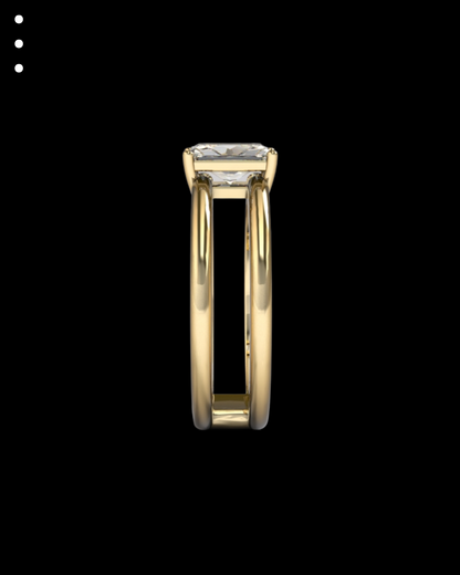 Gold ring with a diamond on a black background