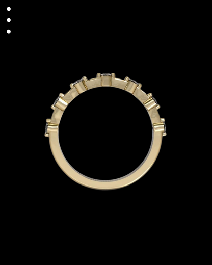 Gold ring with a black background